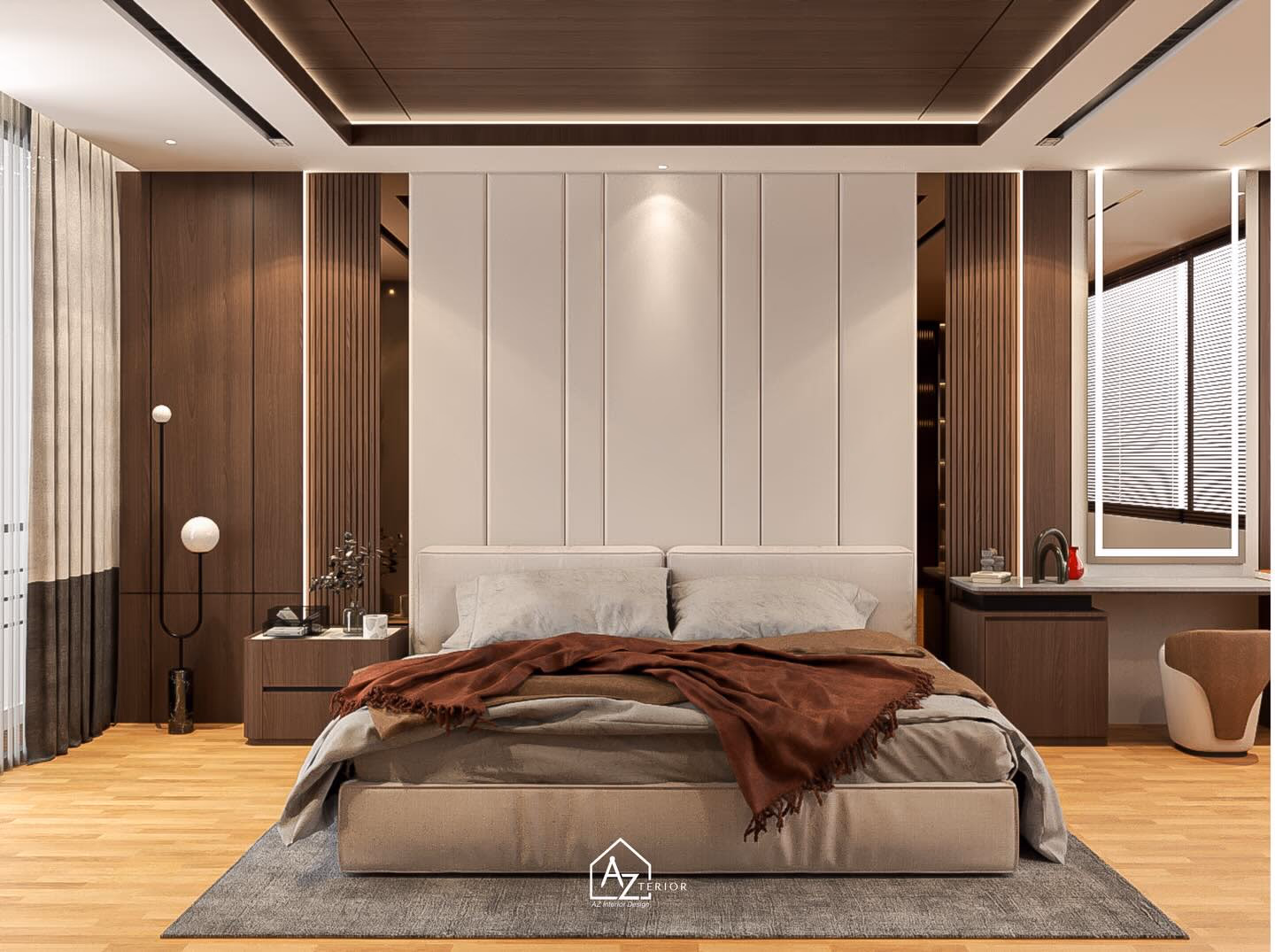 A low upholstered bed against a fluted cream headboard wall, walnut panelling and a backlit mirror either side