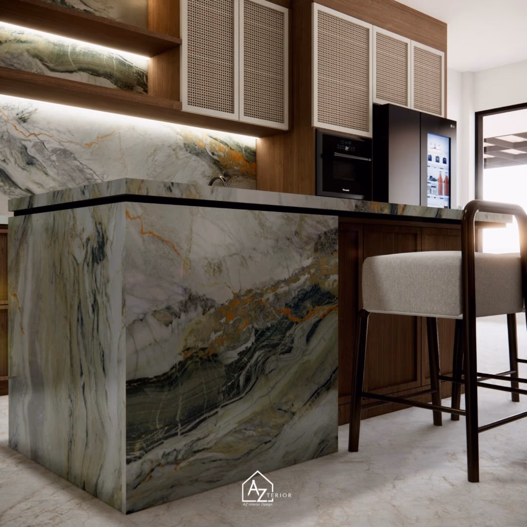 The mitred corner of the island, book-matched so the veining turns the angle without a break