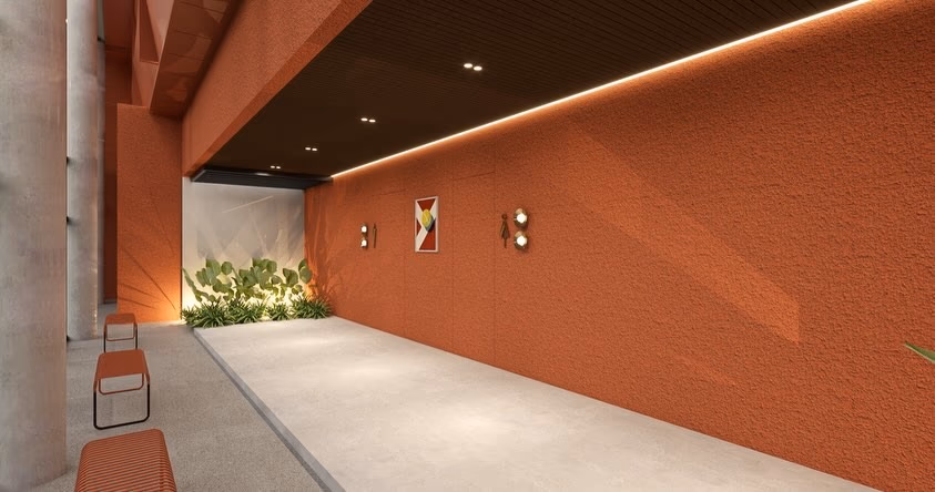 A circulation spine in rendered terracotta, with a lit planting bed and a run of bench seating