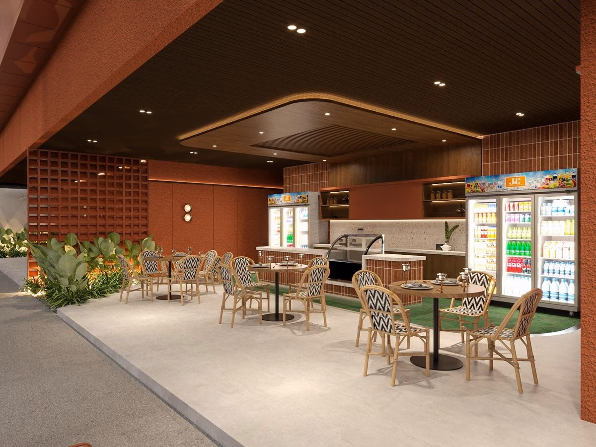 The café from the terrace side, breeze-block screen and planting to one side of the seating