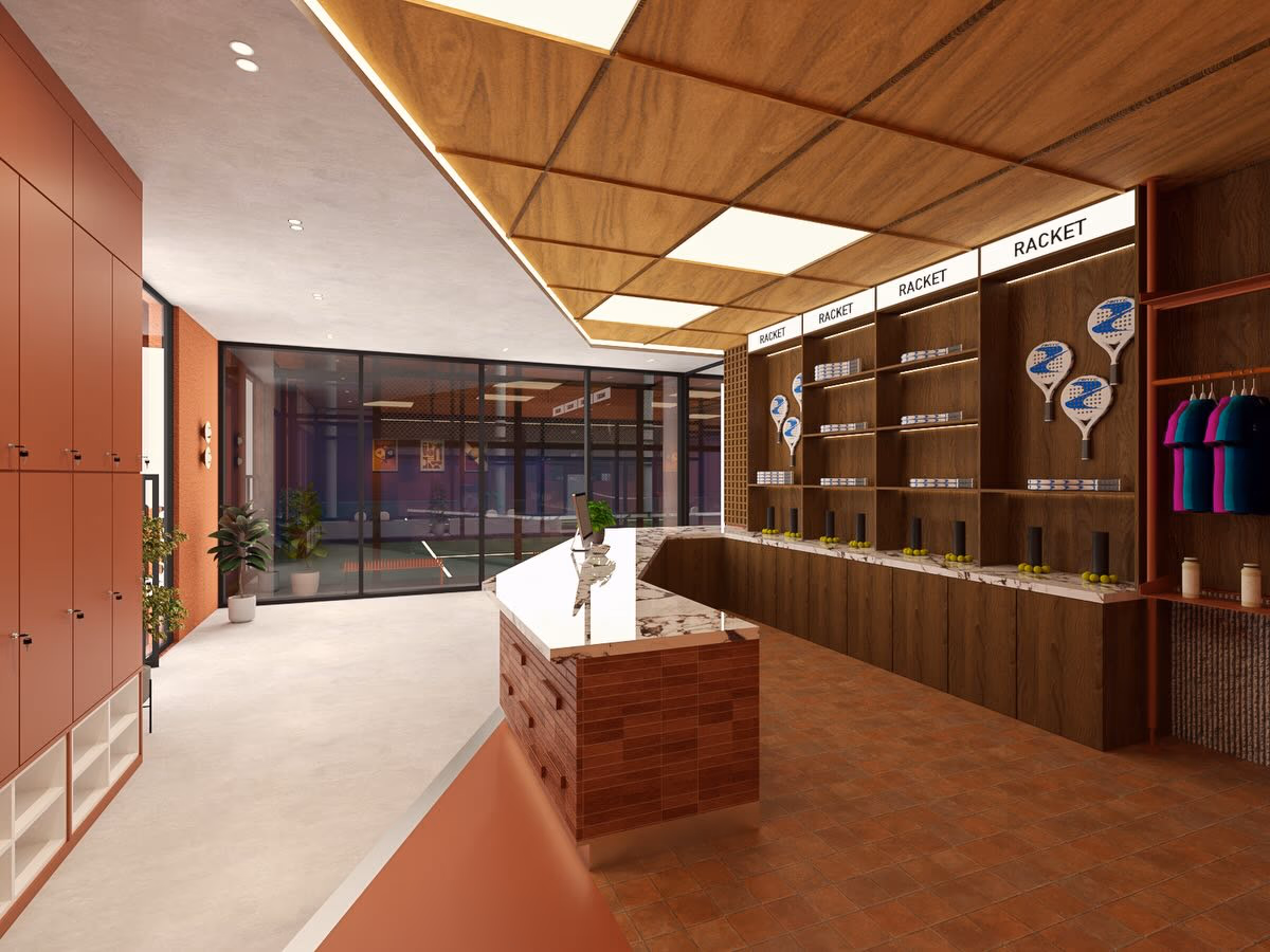The pro shop from the lockers, with the counter turned towards the glazing and the courts beyond it